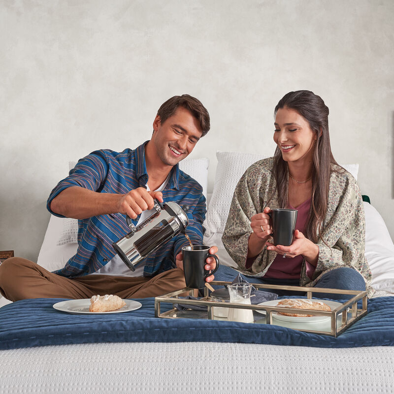 TEMPUR-Ergo® 2.0 Power Adjustable Base - lifestyle photo of two having coffee in bed image number 4
